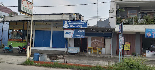 JNE TIGARAKSA 1